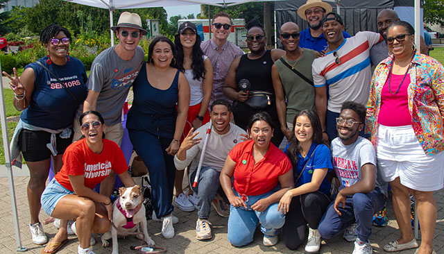 alumni volunteers and students posing