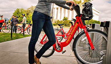 CaBi-return2 A rider using a Capital Bikeshare bike