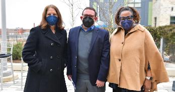 Pres. Sylvia Burwell, AU Trustee and JPMorgan Chase Vice Chair Peter Scher, and SOE Dean Cheryl Holcomb-McCoy celebrate at Martha's Table in the District.