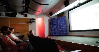 AU students and members of community watch films created in the Community Documentary course.