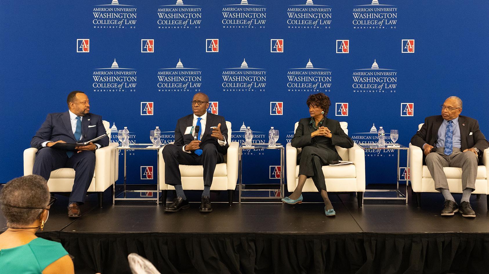 Left to right: Dean Fairfax, Judge Gerald Bruce Lee (Ret.) '76, Jaqueline Jackson '74, and Judge Reggie B. Walton '74 Left to right: Dean Fairfax, Judge Gerald Bruce Lee (Ret.) '76, Jaqueline Jackson '74, and Judge Reggie B. Walton '74