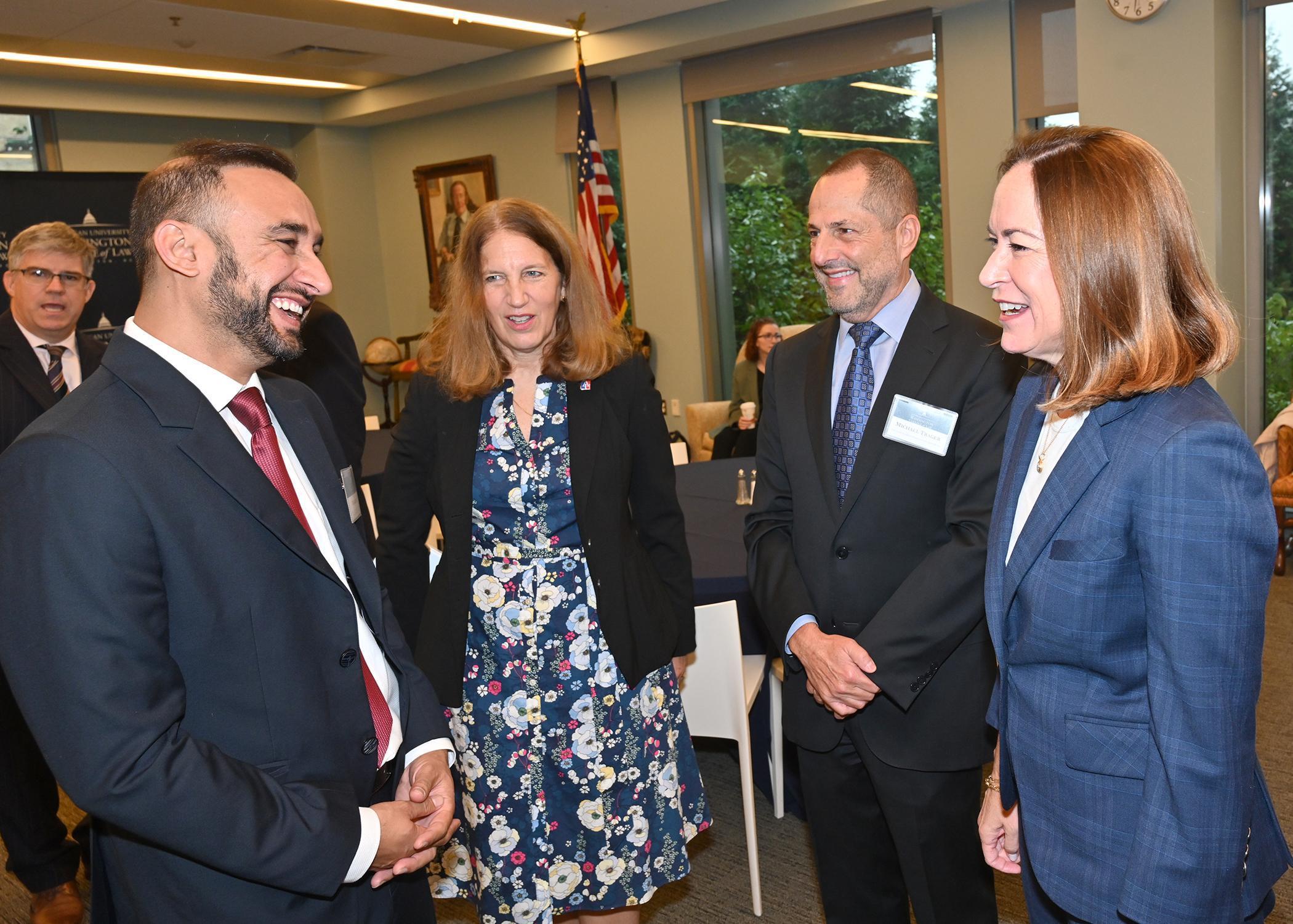 Asst Secretary of State Lee Satterfield, (right) and AU President Sylvia Burwell, speak with a Humphrey Fellow. Asst Secretary of State Lee Satterfield, (right) and AU President Sylvia Burwell, speak with a Humphrey Fellow.